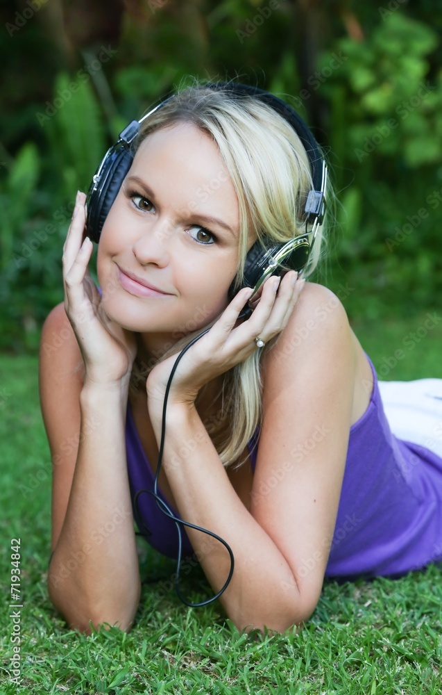 Pretty Young Blonde Lady with Earphones Pretty Young Blonde Lady with Earphones