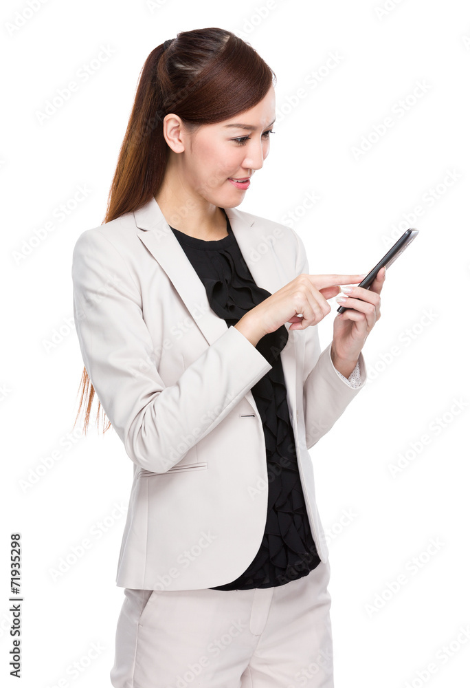 Businesswoman touch on mobile phone Businesswoman touch on mobile phone