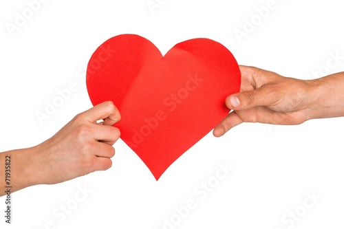 Hands holding red heart