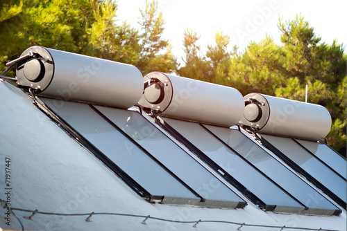 solar panels and boilers for alternative water heating