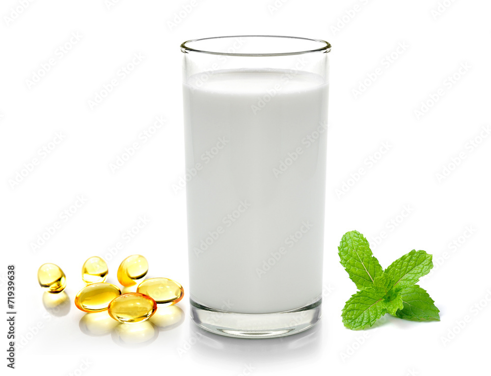 glass of milk mint and fish oil isolated on white background glass of milk mint and fish oil isolated on white background