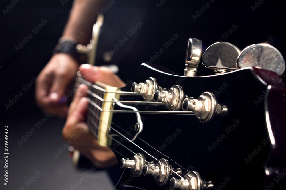 Fototapeta premium guitar in man's hands