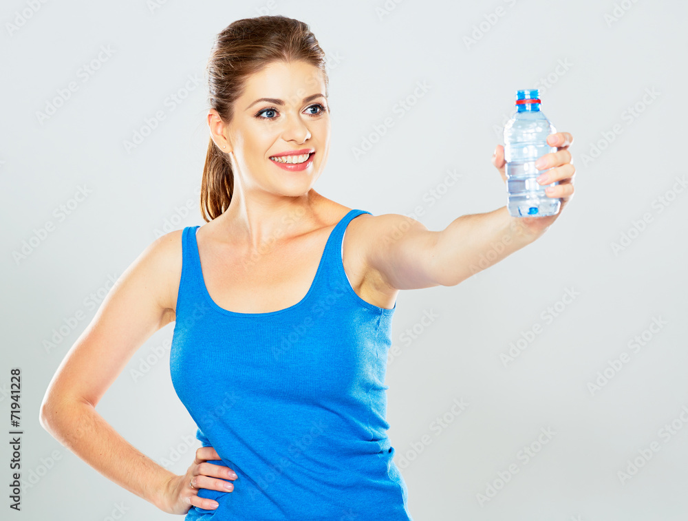 portrait of athletic woman with bottle of water posing inn stud portrait of athletic woman with bottle of water posing inn stud