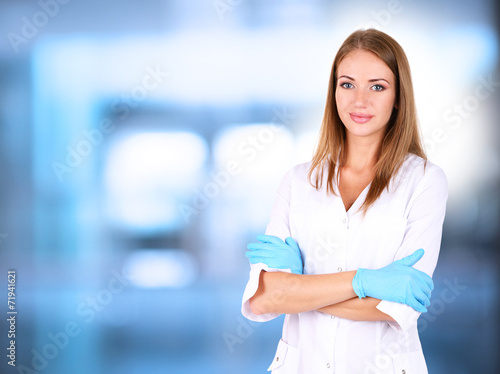 Young beautiful doctor in h...