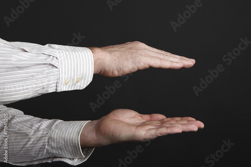 Εκτύπωση καμβά Caucasian male hands protect something