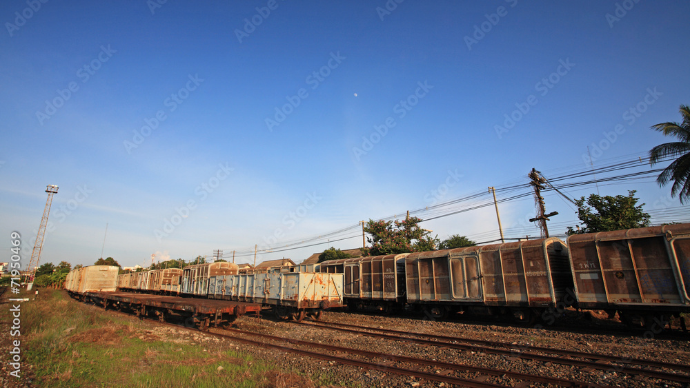 Thai train on railway track against blue sky Thai train on railway track against blue sky