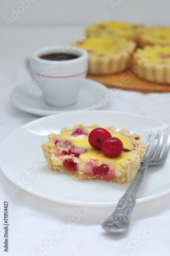 Cherry tarts with cream cheese filling, selective focus