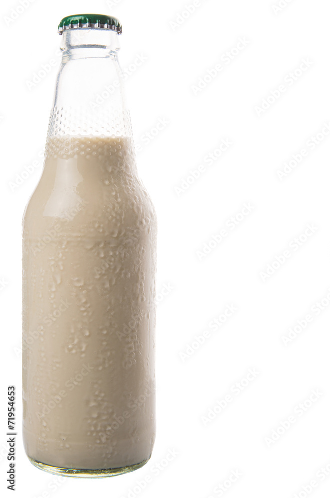 A bottle of soybean milk over white background A bottle of soybean milk over white background