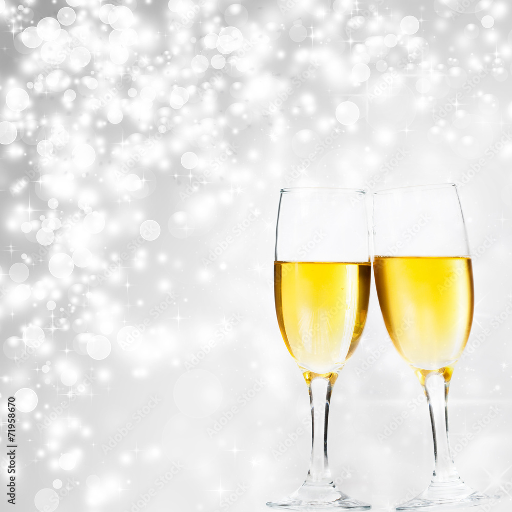 Glasses with champagne and clock close to midnight Glasses with champagne and clock close to midnight