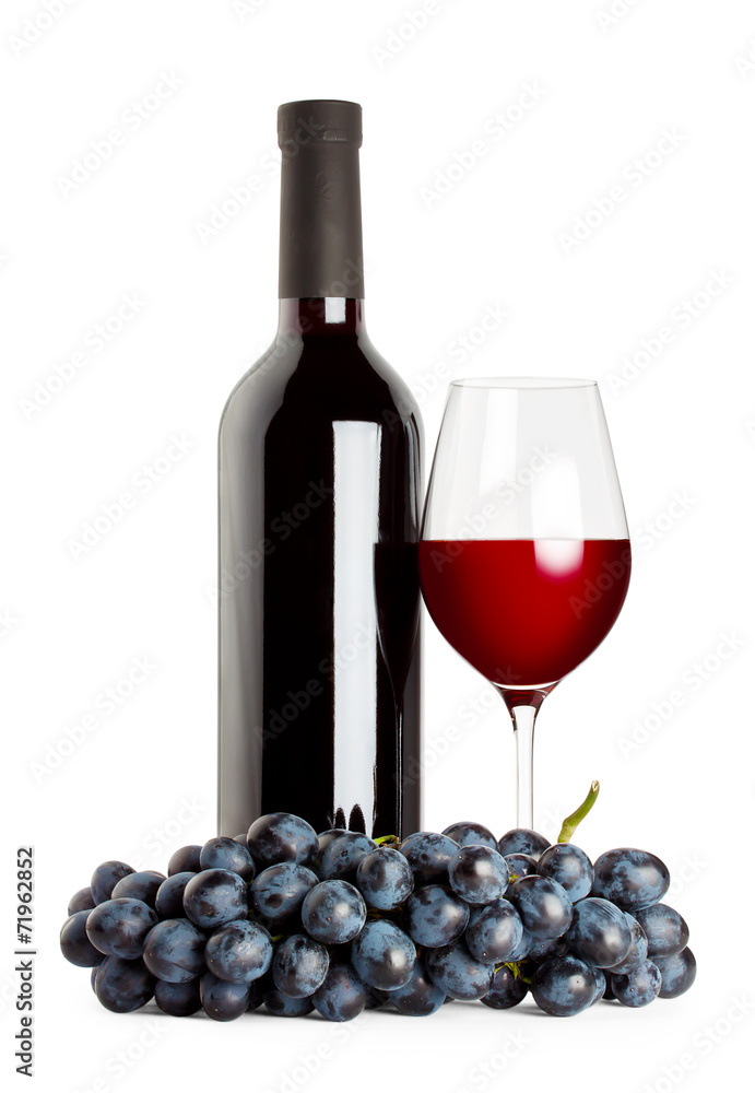 Bottle and glass of red wine with grapes