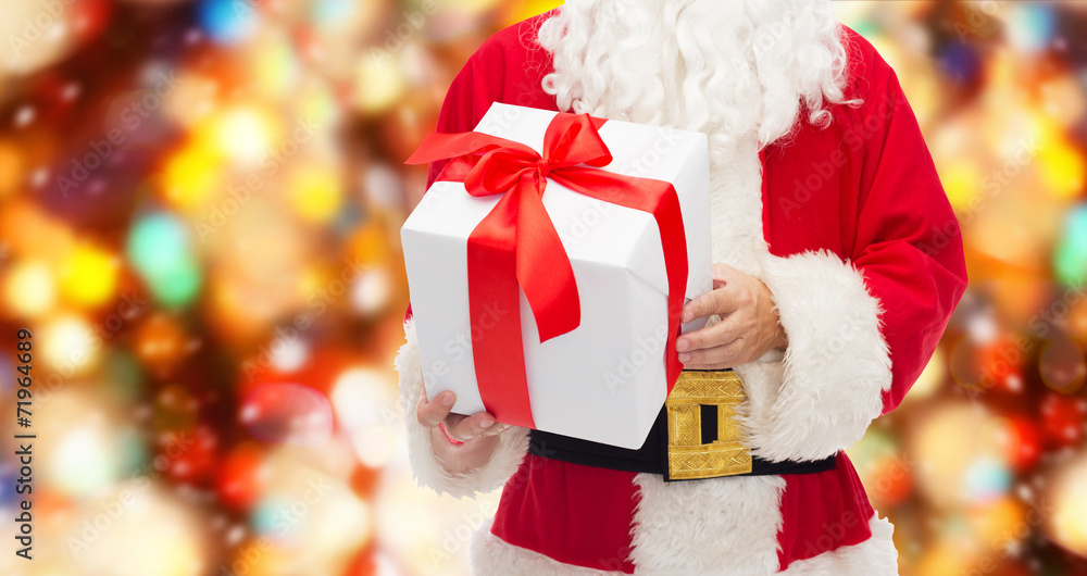 close up of santa claus with gift box close up of santa claus with gift box