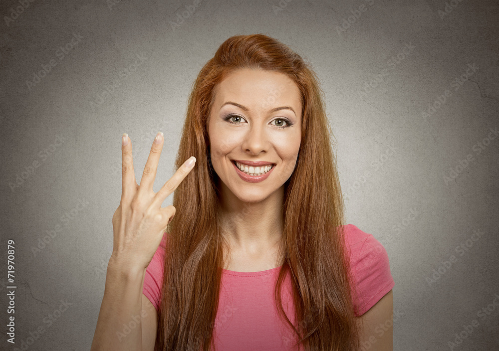 Naklejka premium Portrait woman giving three fingers gesture offers 3 deals 