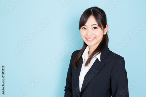 asian businesswoman on blue background