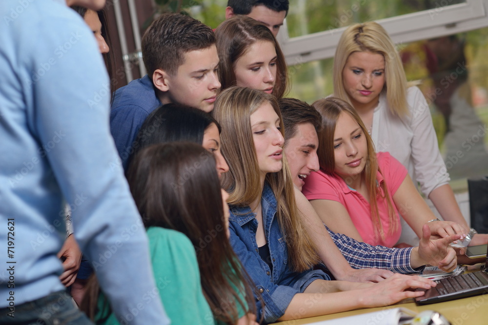 happy teens group in school