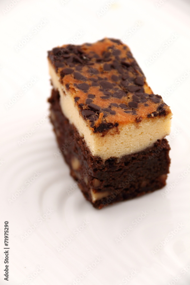 brownie Cheese cake on a white plate. brownie Cheese cake on a white plate.