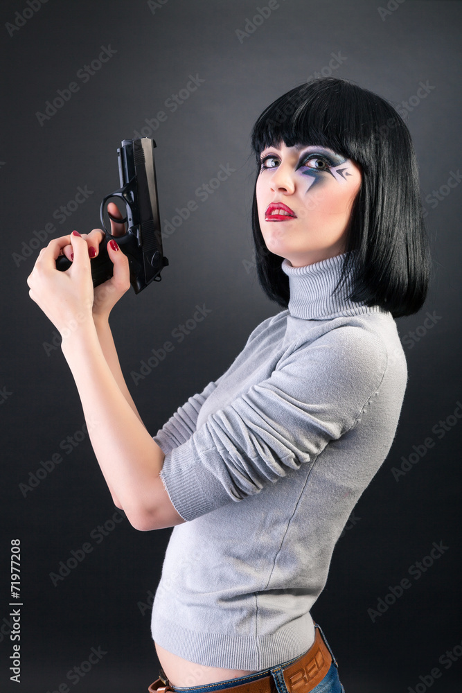 Beautiful woman with face art trying to make suicide Beautiful woman with face art trying to make suicide
