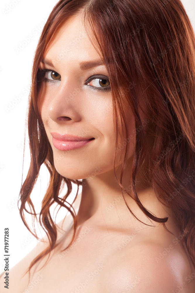 Naklejka premium Portrait of young woman with red hair