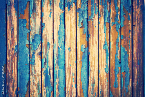 Vintage background from old wooden wall with peeling paint © vvvita