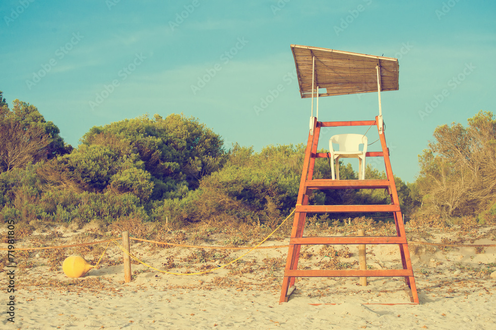 Empty lifeguard tower on the beach. Empty lifeguard tower on the beach.