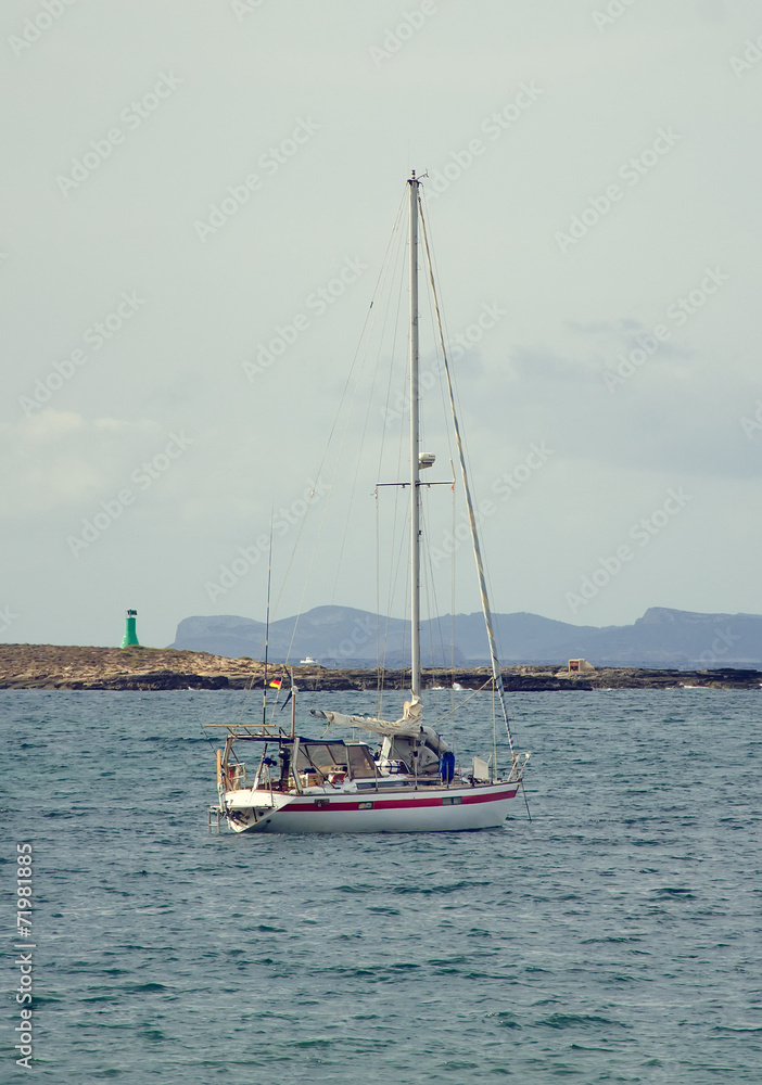 Yacht in the bay at anchor. Yacht in the bay at anchor.