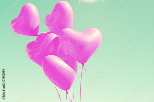 Bunch of purple heart-shaped balloons
