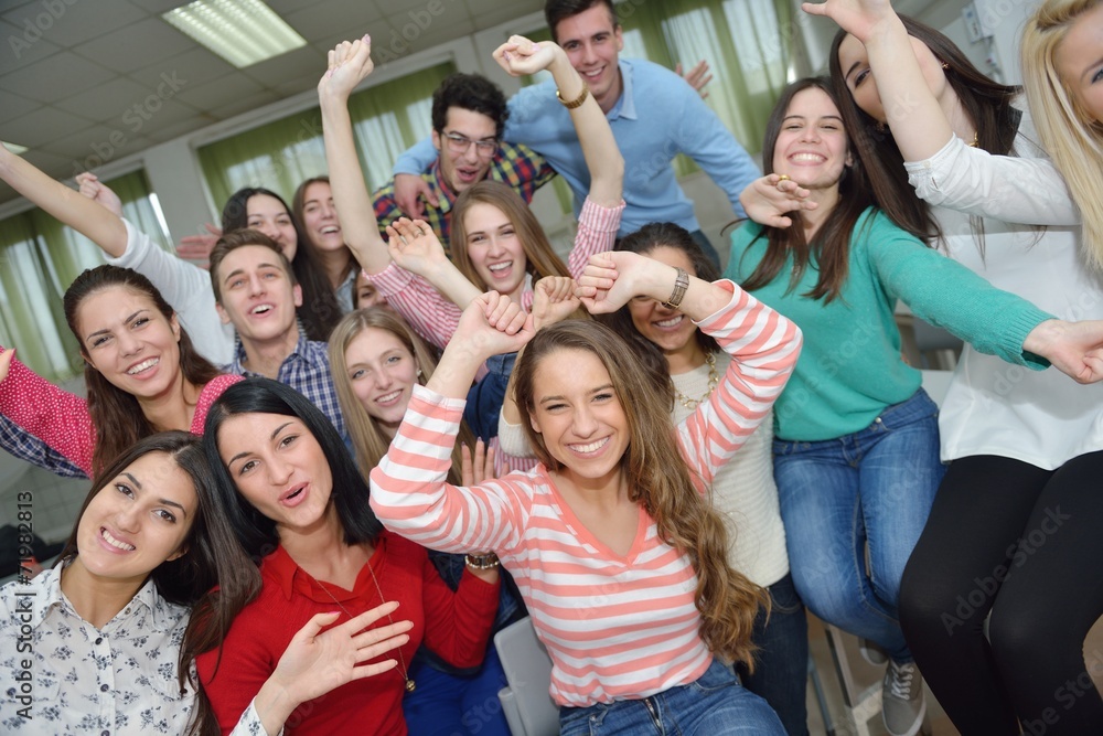 happy teens group in school happy teens group in school