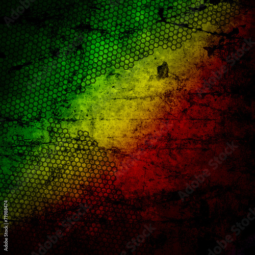 Cuadro en lienzo Red, yellow, green rasta flag on grunge textured concrete  wall
