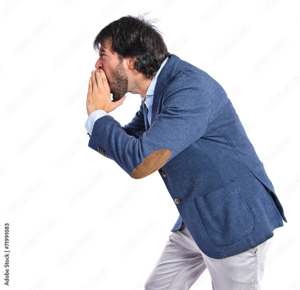Businessman shouting over isolated white background Businessman shouting over isolated white background
