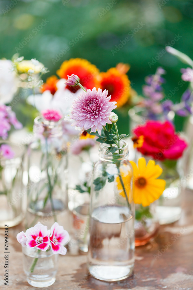 nice flowers in the bottles