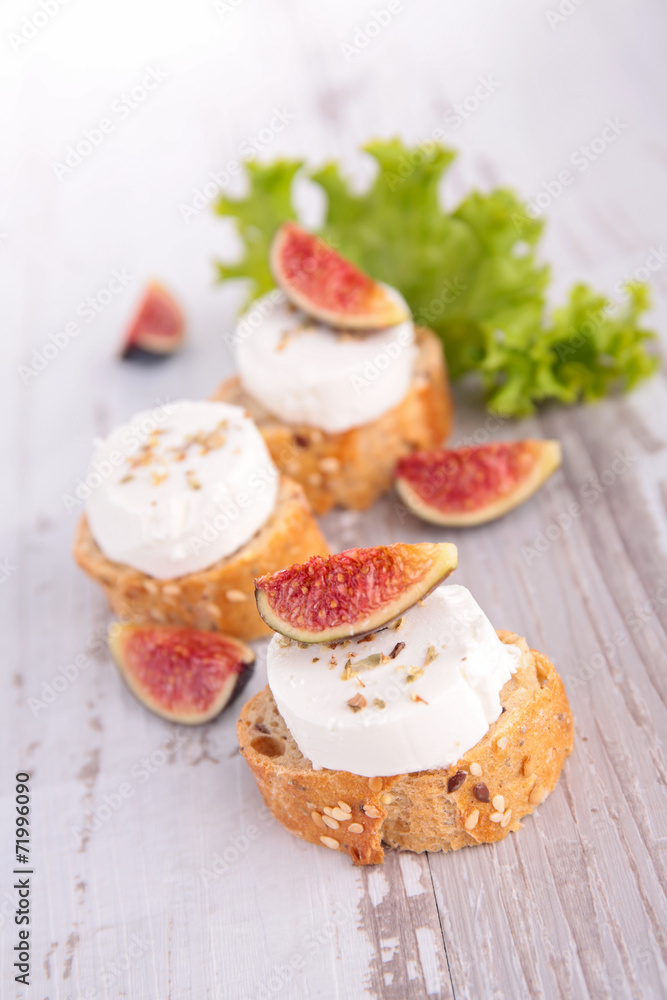 bread with cheese and fresh fig