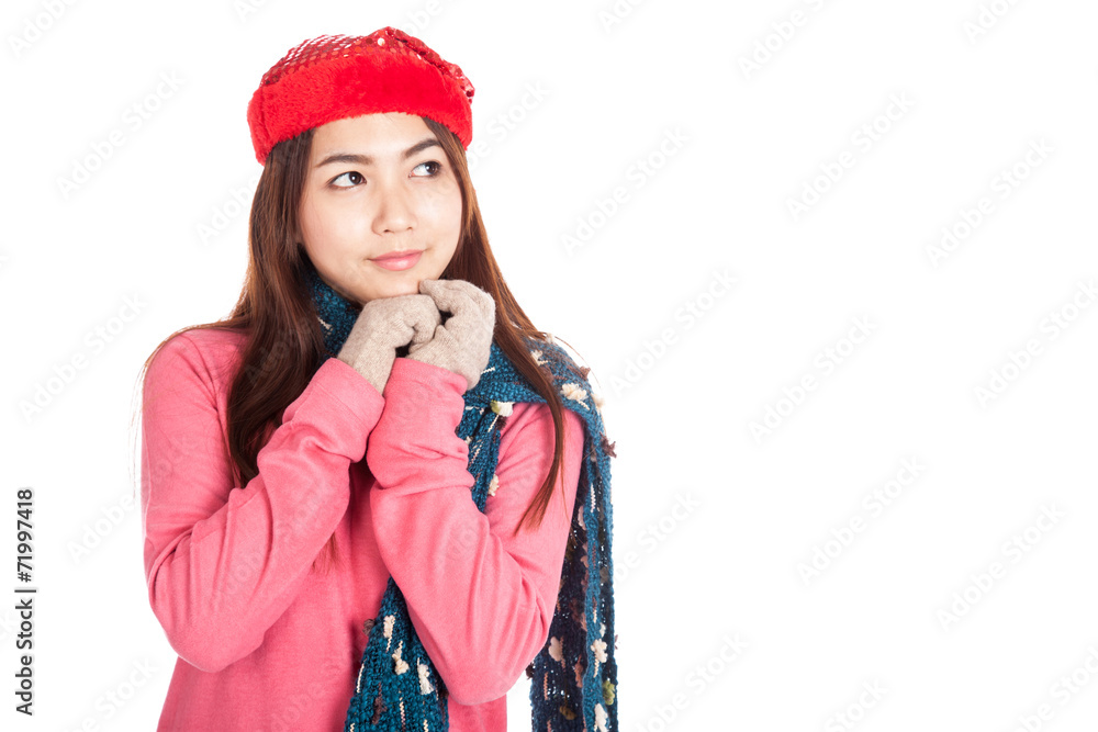 Asian girl with red christmas hat dreaming of something Asian girl with red christmas hat dreaming of something