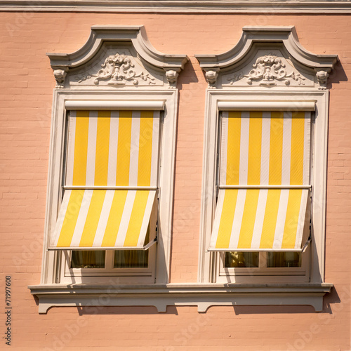 Window in square format - two windows with striped sun shades
