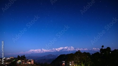 Night sky time-lapse over the Himalayas in Bandipur, Nepal photo