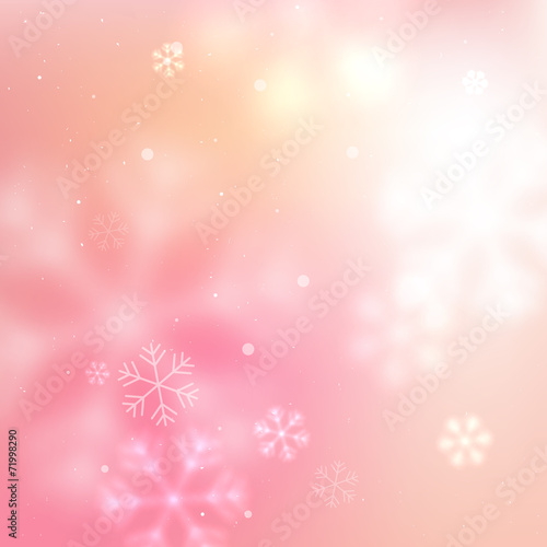 Pink blurred snowflakes background