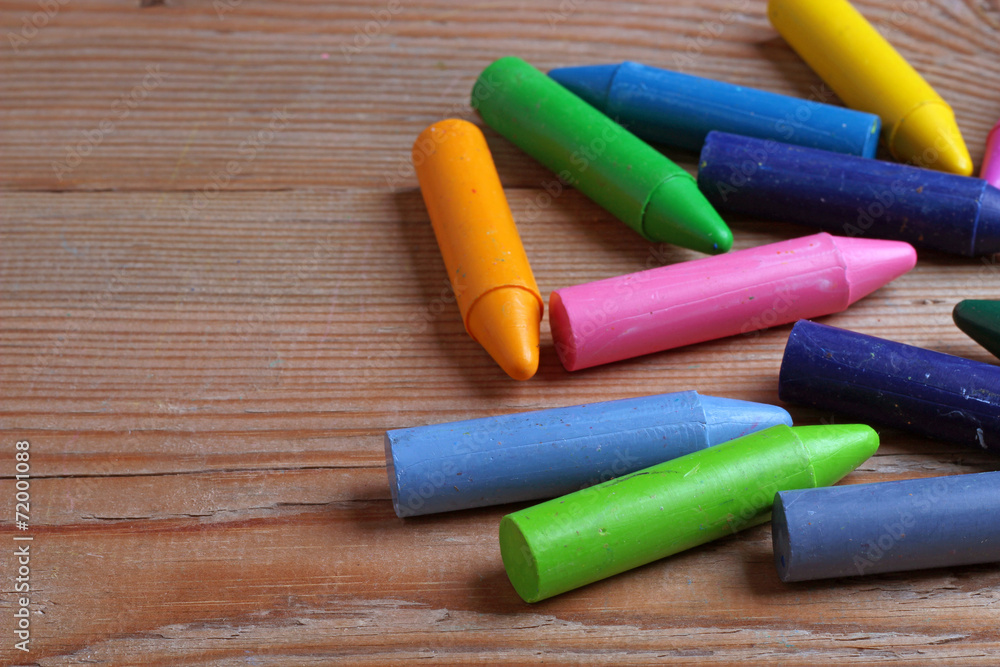 Crayons on a wooden table Crayons on a wooden table
