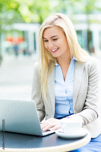 Businesswoman at outdoor cafe