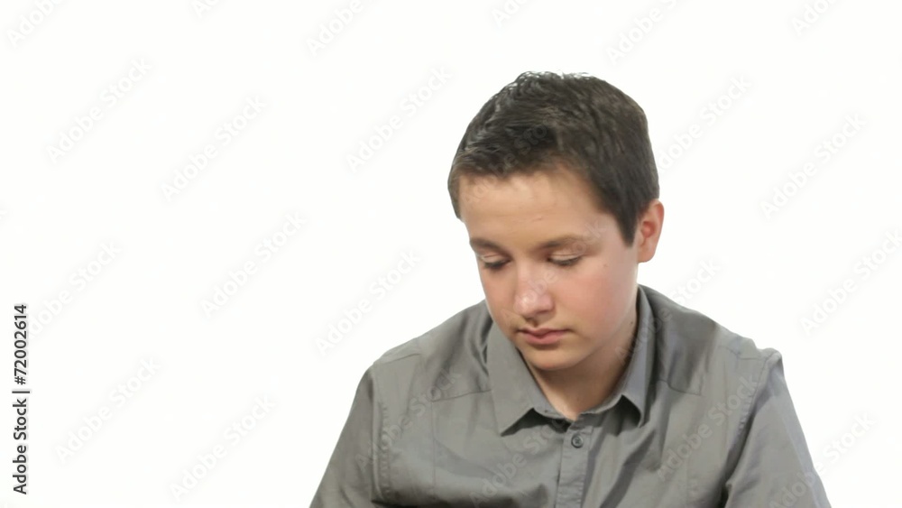 Teenager boy receiving and replying to text message Teenager boy receiving and replying to text message