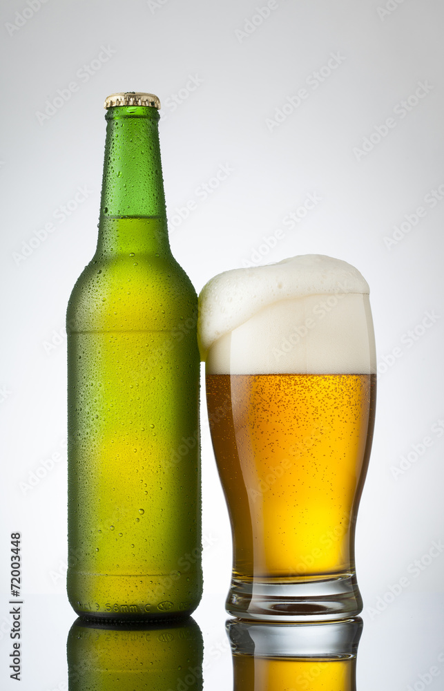 Beer in glass and bottle ready for branding Beer in glass and bottle ready for branding