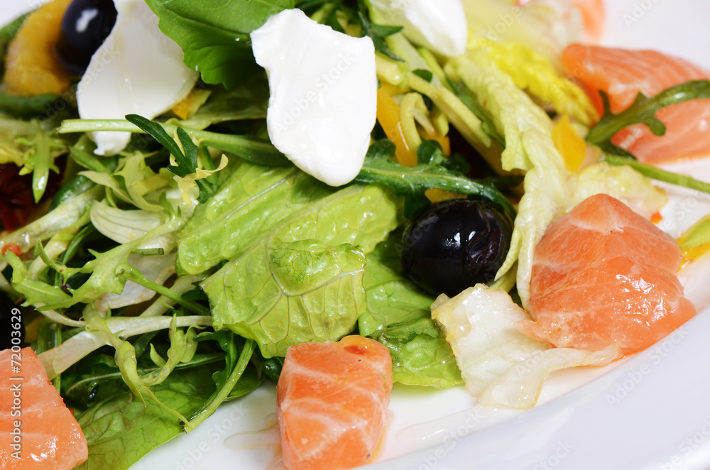 Salad with salmon and mascarpone cheese, pomelo leaves, lettuce Salad with salmon and mascarpone cheese, pomelo leaves, lettuce