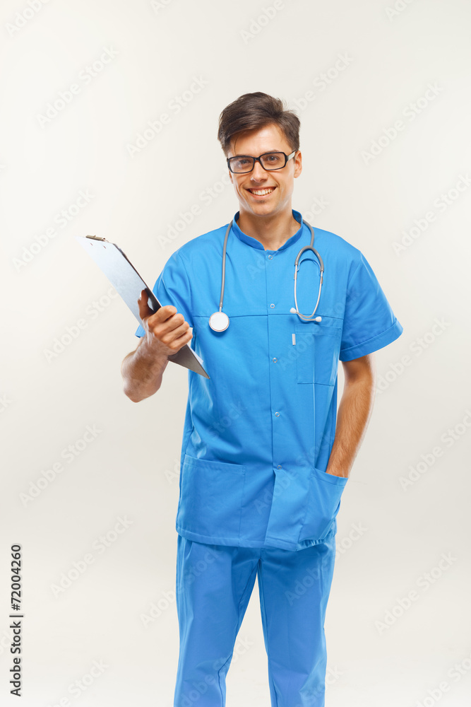 Doctor With Stethoscope Around his Neck Against Grey Background Doctor With Stethoscope Around his Neck Against Grey Background