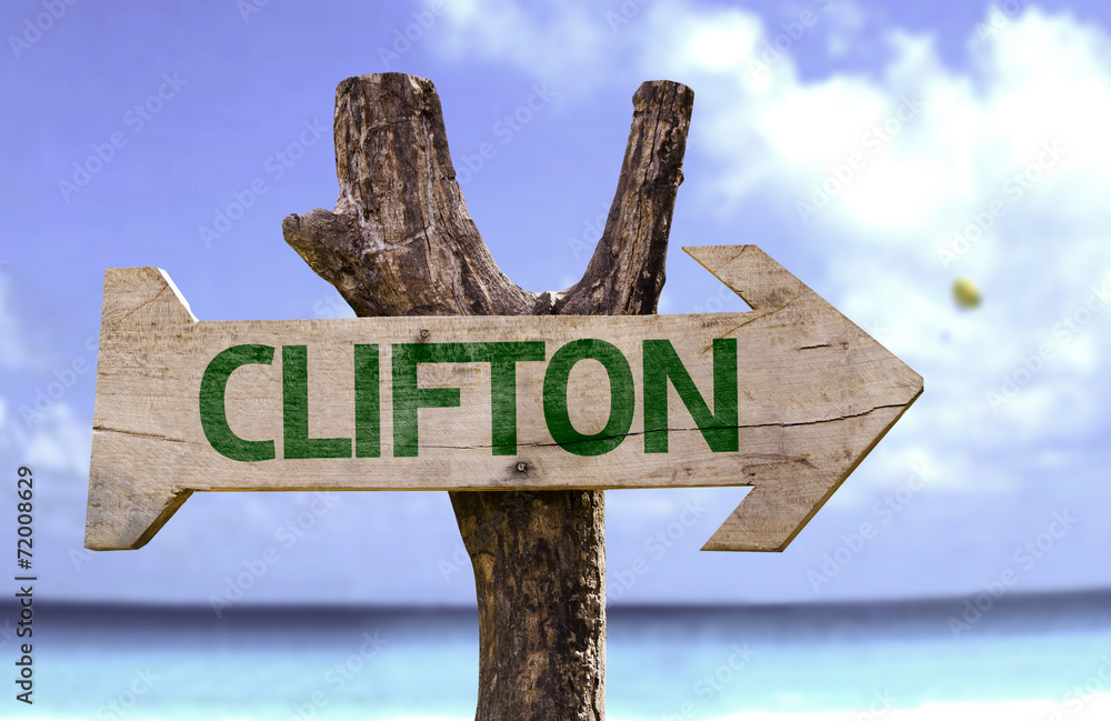Clifton wooden sign with a beach on background
