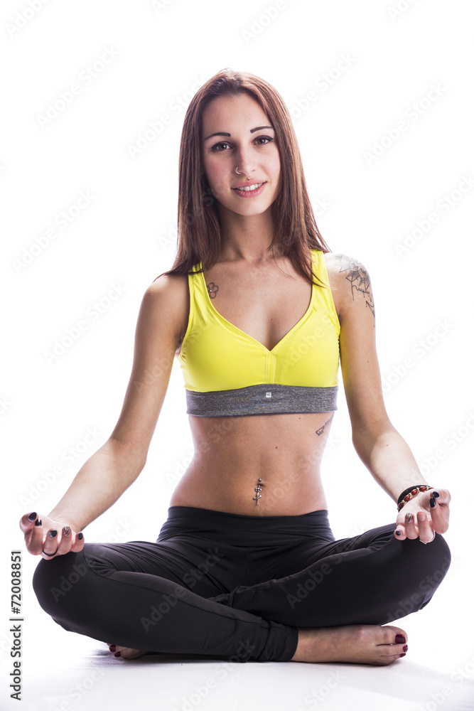 Fototapeta premium Ragazza Sorridente che pratica Yoga