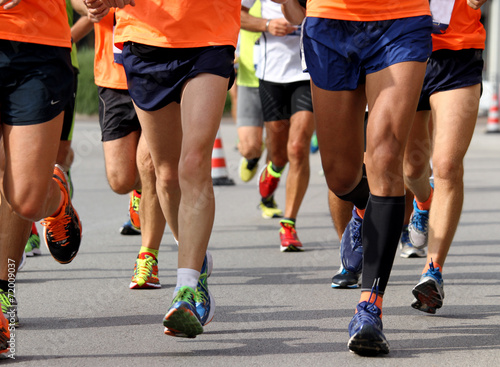 runners engaged in strenuous Marathon