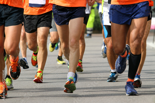 runners engaged in strenuous Marathon