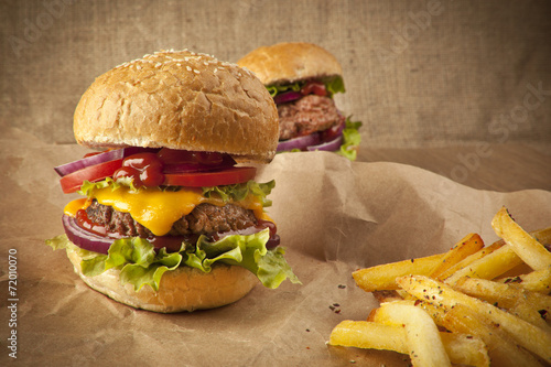 Fresh hamburgers with fries photo