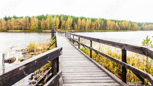 Fototapeta Naklejka Na Ścianę i Meble -  Ferry on lake in autumn