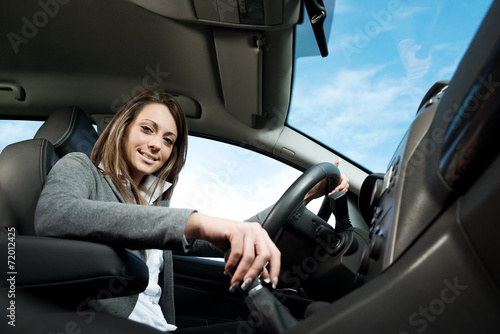 Young attractive woman driving © StockPhotoPro