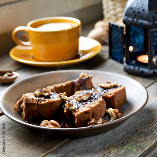 Cake with chocolate and tea with lemon