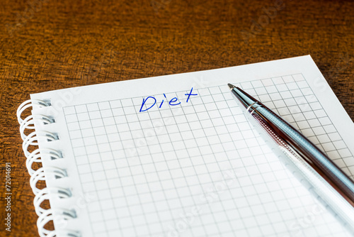 Diet sign in the notebook by pen