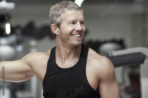 Handsome model portrait at gym